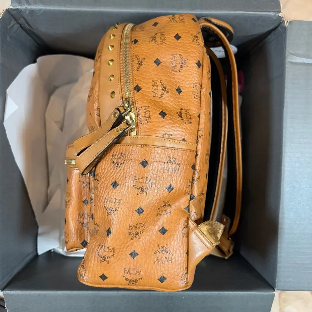 MCM Visetos Studded Medium Stark M Logo Collection Backpack Cognac Monogram
